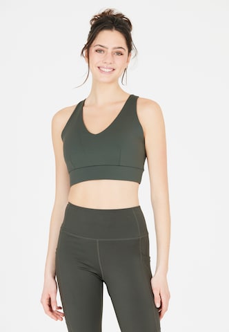 Athlecia Medium Support Sports Bra 'Dilraba' in Green: front