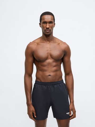 BOSS Swimming shorts 'Swordfish' in Black: front