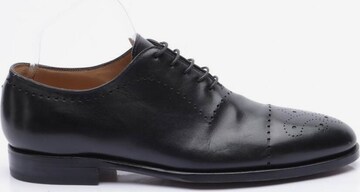 Kiton Flats & Loafers in 44 in Black: front