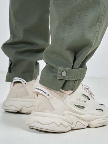 ABOUT YOU x Swalina&Linus Regular Cargo Pants 'Marlo' in Green