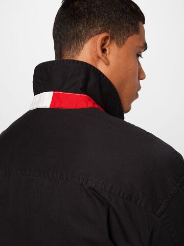 Tommy Jeans Between-Season Jacket 'Harrigton' in Black