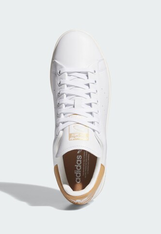 Chaussure de sport ADIDAS PERFORMANCE en blanc