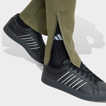 ADIDAS SPORTSWEAR Tapered Workout Pants in Green