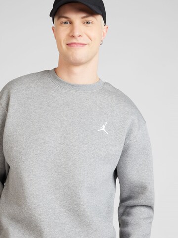 Sweat-shirt 'ESS' Jordan en gris