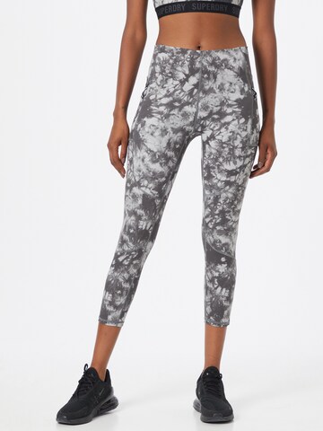 Skinny Pantalon de sport Superdry en gris : devant