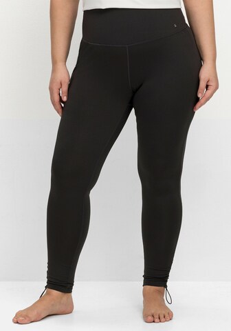 SHEEGO - Skinny Leggings em cinzento: frente