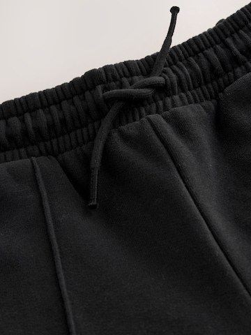 Wide leg Pantaloni di Next in nero