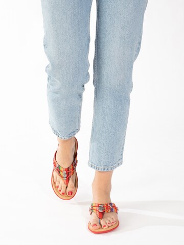 Minnetonka T-Bar Sandals 'Silverthorne 360' in Orange