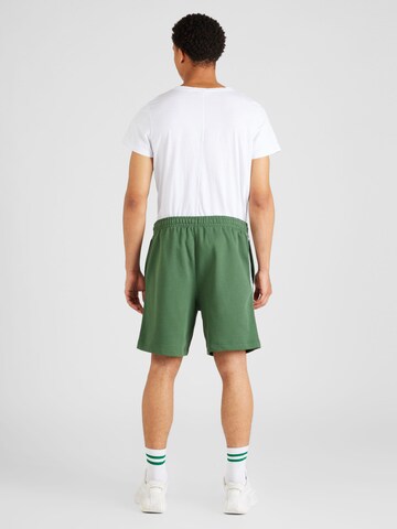 LACOSTE Normalny krój Spodnie w kolorze zielony