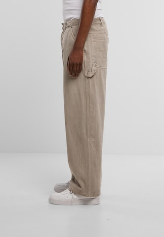 Nike Sportswear Baggy Jeans in Grau