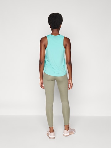 NIKE Skinny Sportnadrágok - zöld