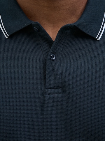 Jack & Jones Plus Poloshirt 'JJEAustin' in Schwarz