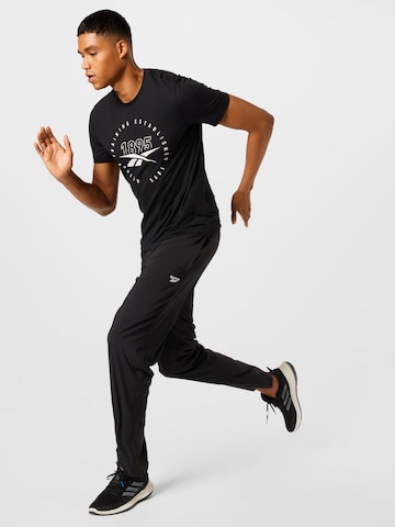 Regular Pantaloni sport de la Reebok pe negru