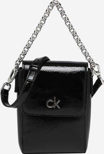 Rankinė su ilgu dirželiu iš Calvin Klein, spalva – juoda, Prekių apžvalga