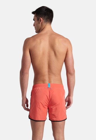 Pantaloncini da bagno 'TEAM STRIPE' di ARENA in rosso