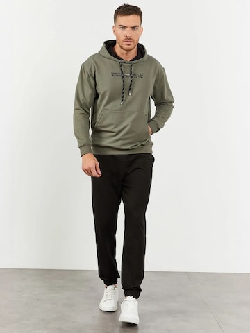 Tommy Life Sweat suit in Green: front