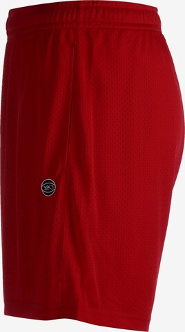 Loosefit Pantaloni sportivi di K1X in rosso