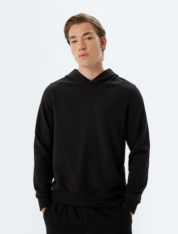 Koton Sweatshirt in Zwart: voorkant