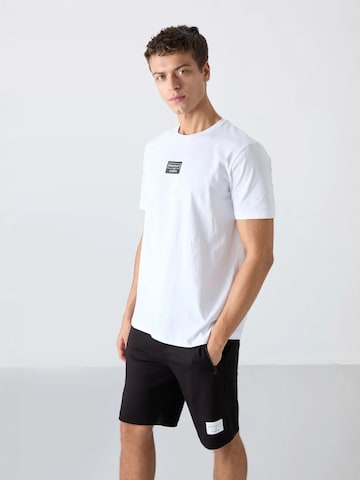 Completo sportivo di Tommy Life in nero