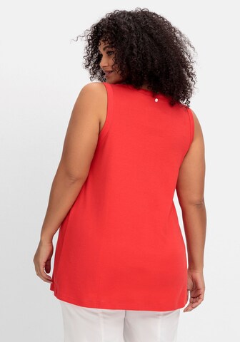 Top di SHEEGO in rosso