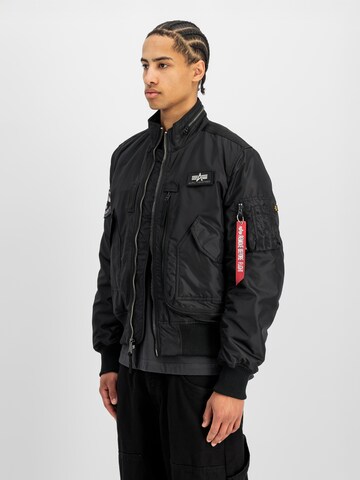 ALPHA INDUSTRIES Between-Season Jacket 'Engine' in Black: front