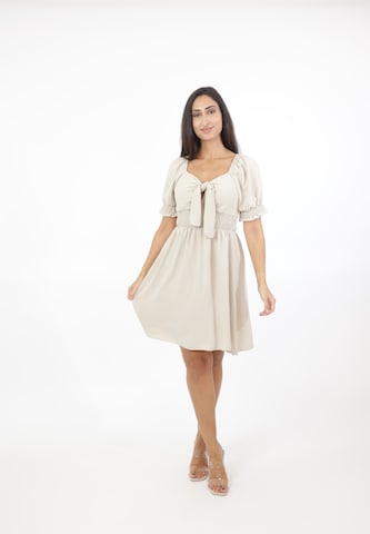 Elara Dress in Beige: front