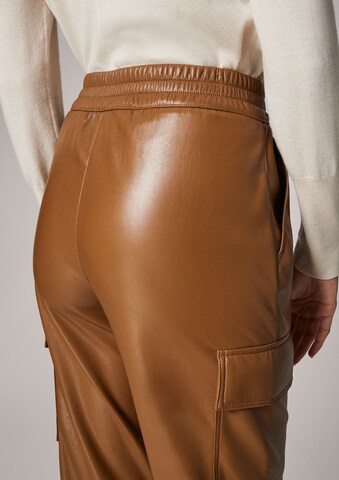 COMMA Tapered Hose in Braun