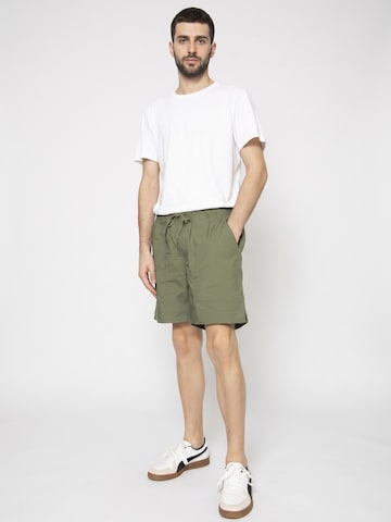 Baggy Pantaloni 'Everyday Coolmax Short Green' di Brixton in verde
