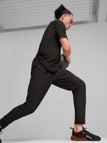 juoda PUMA Standartinis Sportinės kelnės 'Ultraweave'