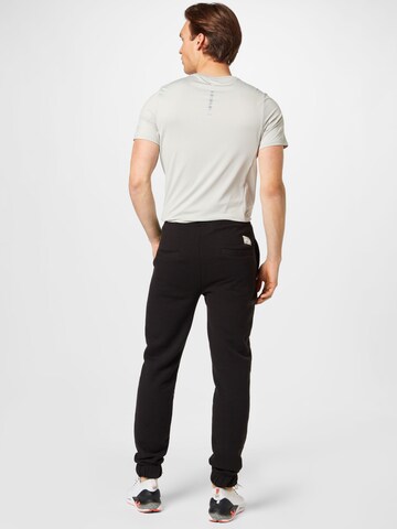 !Solid Tapered Trousers in Black