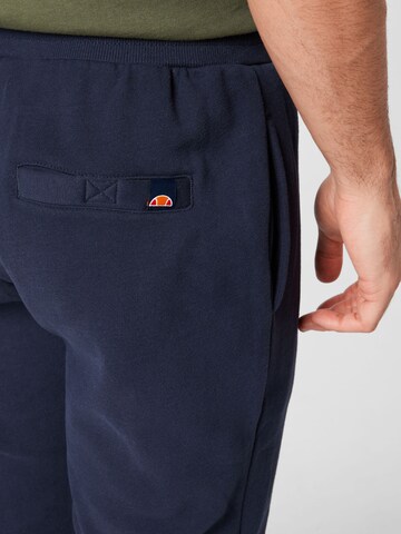 ELLESSE Tapered Byxa i blå