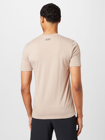 Tricou funcțional de la UNDER ARMOUR pe bej