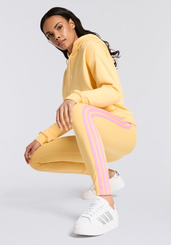 ADIDAS SPORTSWEAR Skinny Workout Pants 'Essentials' in Yellow