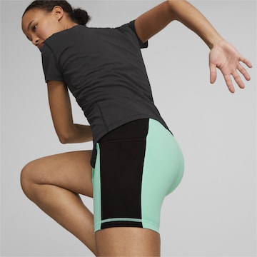 Skinny Pantalon de sport PUMA en vert