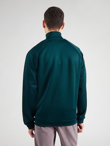 Giacca di felpa 'The First' di ADIDAS ORIGINALS in verde