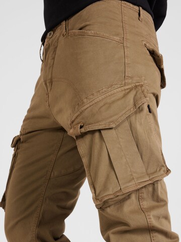 Coupe slim Pantalon cargo 'Spy' ALPHA INDUSTRIES en marron