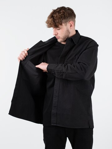 Carhartt WIP Jacke 'Reno' in Schwarz