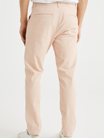 WE Fashion Slim fit Chino trousers in Pink