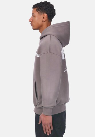 Dropsize Sweatshirt 'Elite Hustlers' in Brown