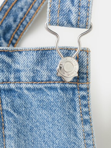 MANGO KIDS Latzrock 'MIA' in Blau