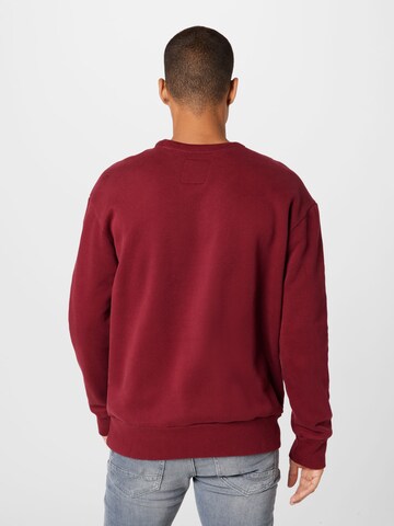 HOLLISTERSweater majica 'JOCKTAG' - crvena boja