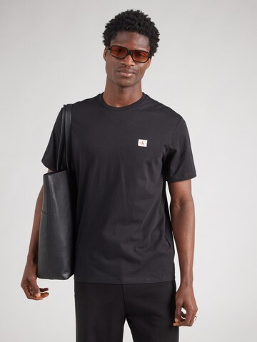 Calvin Klein Jeans - Camiseta en negro: frente