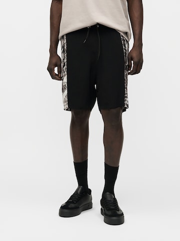 Carlo Colucci Loosefit Broek in Zwart: voorkant