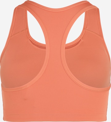 Bustino Reggiseno sportivo di NIKE in rosso