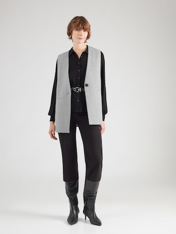 King Louie Blus 'Carina' i svart