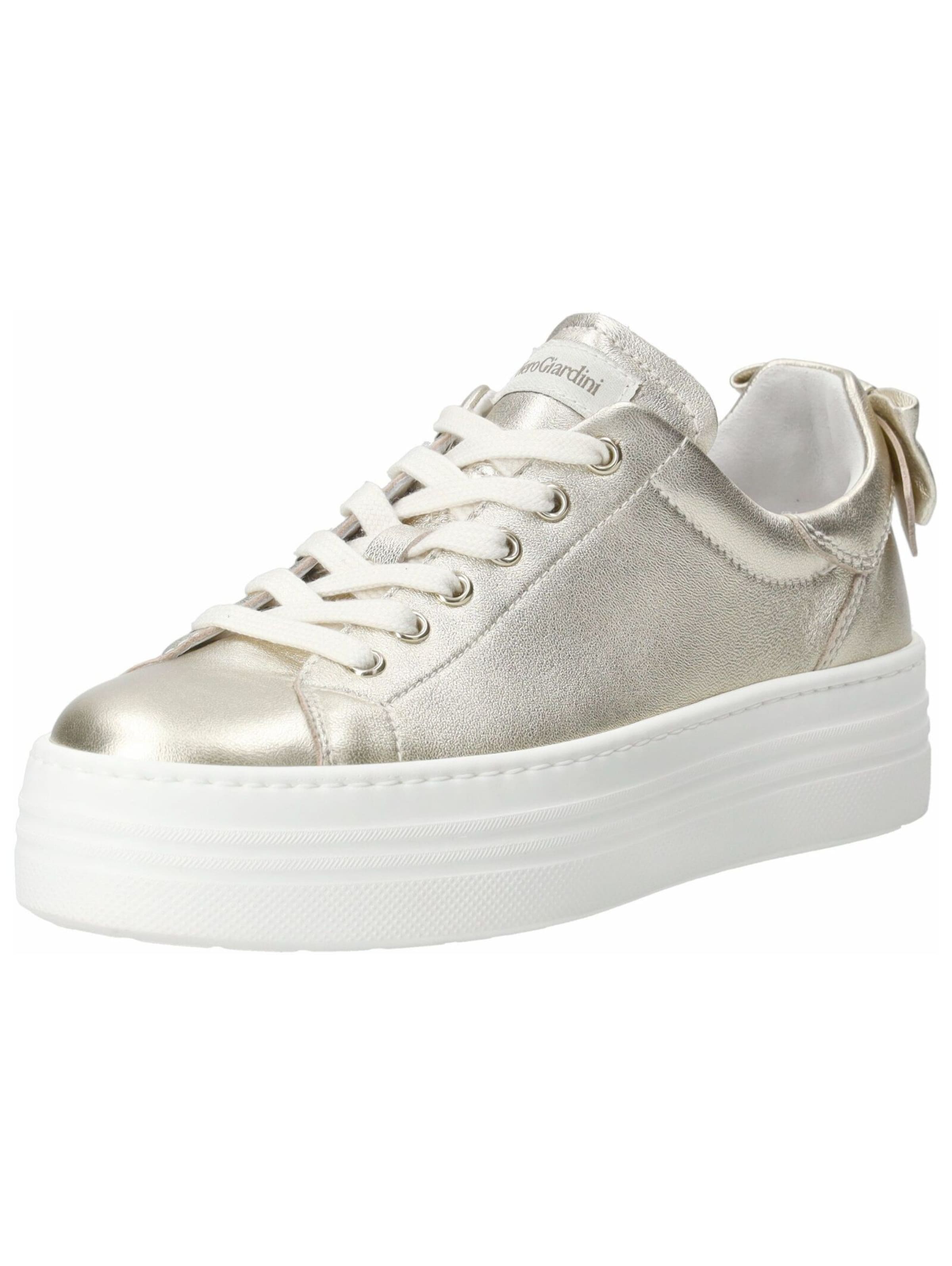 Baskets basses Nero Giardini en or : devant