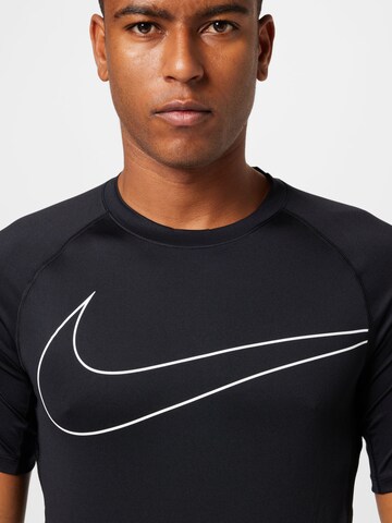 NIKE - Camisa funcionais 'Novelty' em preto