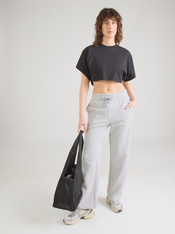 Regular Pantaloni sport 'Rival' de la UNDER ARMOUR pe gri