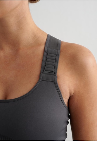 Bustino Reggiseno sportivo di Aim'n in grigio