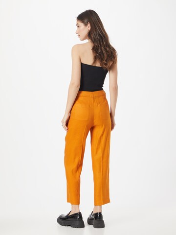 Stefanel - regular Pantalón de pinzas en naranja